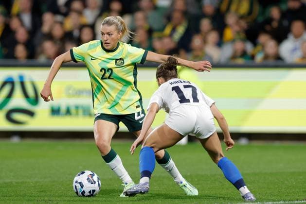 SOCCER AUSTRALIA SLOVENIA, Charlotte Grant of of Australia under pressure from Izabela Krizaj of Slovenia during the Women s friendly international soccer match between Australia and Slovenia at HBF Park in Perth, Sunday, June 29, 2025. ( NO ARCHIVING, EDITORIAL USE ONLY PERTH WESTERN AUSTRALIA AUSTRALIA  Copyright: xRICHARDxWAINWRIGHTx 20250629127653326856