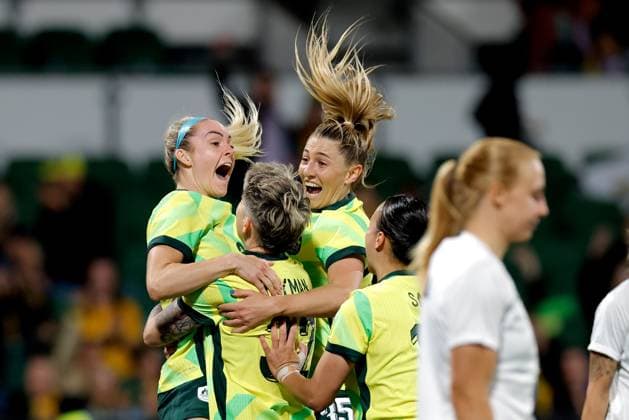 SOCCER AUSTRALIA SLOVENIA, Michelle Heyman of Australia is congratulated by Ellie Carpenter and Remy Siemsen of Australia after scoring a goal during the Women s friendly international soccer match between Australia and Slovenia at HBF Park in Perth, Sunday, June 29, 2025. ( NO ARCHIVING, EDITORIAL USE ONLY PERTH WESTERN AUSTRALIA AUSTRALIA  Copyright: xRICHARDxWAINWRIGHTx 20250629198980742626