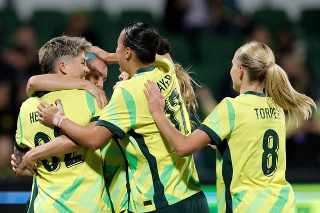 SOCCER AUSTRALIA SLOVENIA, Michelle Heyman (left) of Australia is congratulated by teammates after scoring a goal during the Women s friendly international soccer match between Australia and Slovenia at HBF Park in Perth, Sunday, June 29, 2025. ( NO ARCHIVING, EDITORIAL USE ONLY PERTH WESTERN AUSTRALIA AUSTRALIA  Copyright: xRICHARDxWAINWRIGHTx 20250629155714018920
