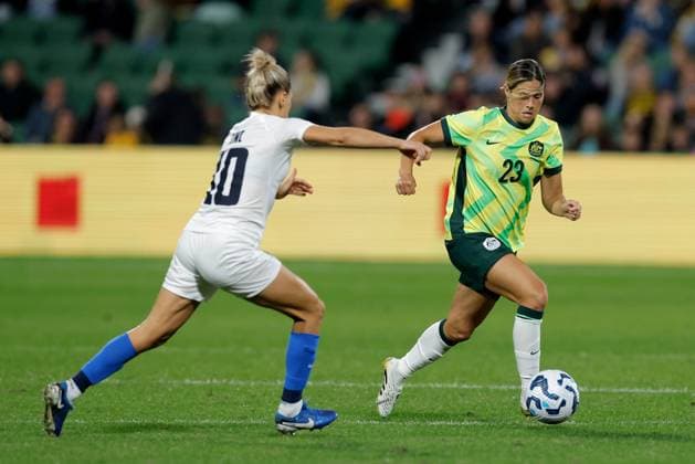 SOCCER AUSTRALIA SLOVENIA, Kyra Cooney-Cross of Australia under pressure from Dominika Conc of Slovenia during the Women s friendly international soccer match between Australia and Slovenia at HBF Park in Perth, Sunday, June 29, 2025. ( NO ARCHIVING, EDITORIAL USE ONLY PERTH WESTERN AUSTRALIA AUSTRALIA  Copyright: xRICHARDxWAINWRIGHTx 20250629171365133901