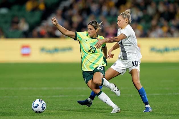 SOCCER AUSTRALIA SLOVENIA, Kyra Cooney-Cross of Australia under pressure from Dominika Conc of Slovenia during the Women s friendly international soccer match between Australia and Slovenia at HBF Park in Perth, Sunday, June 29, 2025. ( NO ARCHIVING, EDITORIAL USE ONLY PERTH WESTERN AUSTRALIA AUSTRALIA  Copyright: xRICHARDxWAINWRIGHTx 20250629174127708850