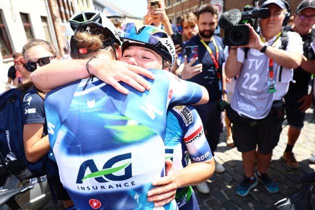 Belgian Justine Ghekiere celebrates with a teammate of AG Insurance-Soudal Team after winning the women s elite road race of the Belgian Cycling Championships, 132,8 km from and to the Grand Place square in Binche on Sunday 29 June 2025. DAVIDxPINTENS  x128053046x
