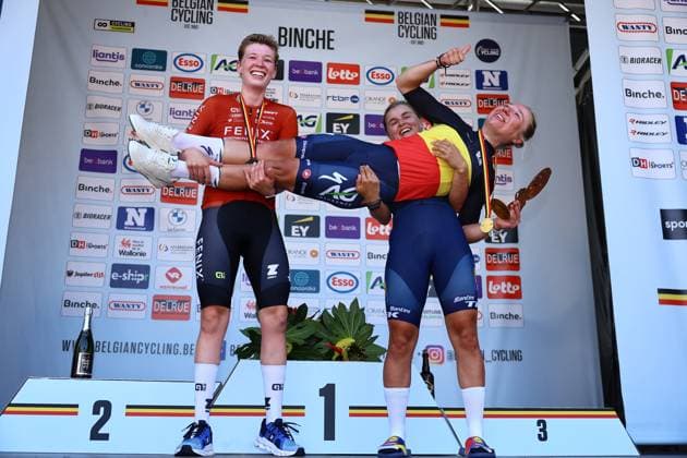Belgian Fien Van Eynde of Fenix-Deceuninck Development Team, Belgian Justine Ghekiere of AG Insurance-Soudal Team and Belgian Fleur Moors of Lidl-Trek pictured on the podium after the women s elite road race of the Belgian Cycling Championships, 132,8 km from and to the Grand Place square in Binche on Sunday 29 June 2025. DAVIDxPINTENS  x128054236x