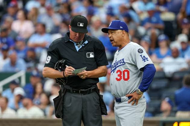 June 29, 2025: Los Angeles Dodgers manager Dave Roberts (30) talks with home plate umpire Cory Blaser (89) during the eighth inning at Kauffman Stadium in Kansas City, MO. CSM Kansas City United States of America - ZUMAc04_ 20250629_zma_c04_116 Copyright: xDavidxSmithx