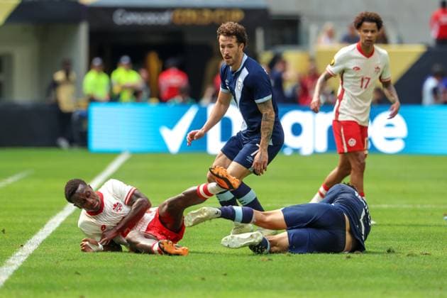 June 29th, 2025: Canada defender Richmond Laryea (22) and Guatemala midfielder Jose Rosales (5) fall while battling for the ball during a CONCACAF Gold Cup quarterfinals soccer match between Canada and Guatemala at US Bank Stadium in Minneapolis, MN. -CSM. Minneapolis USA - ZUMAc04_ 20250629_zma_c04_173 Copyright: xStevenxGarciax