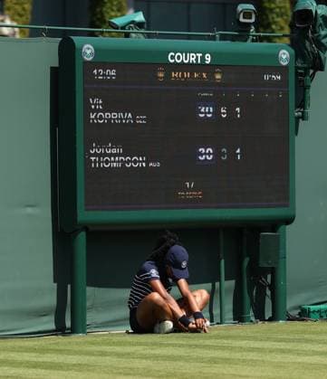 A ball girl feels the heat during Vit Kopriva v Jordan Thompson Wimbledon Tennis Championships, Day 1, The All England Lawn Tennis and Croquet Club, London, UK - 30 Jun 2025London The All England Lawn Tennis and United Kingdom  Copyright: xEllaxLing Shutterstockx 15378844h