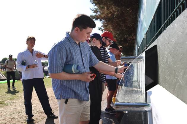 30th June 2025; All England Lawn Tennis and Croquet Club, London, England; Wimbledon Tennis Tournament, Day 1; Wimbledon spectators filling bottles of water to stay hydrated during a heatwave  ActionPlus12807184 JohnxPatrickxFletcher