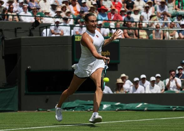 30th June 2025; All England Lawn Tennis and Croquet Club, London, England; Wimbledon Tennis Tournament, Day 1; Aryna Sabalenka (BLR) with a forehand shot to Carson Branstine (CAN)  ActionPlus12807205 JohnxPatrickxFletcher