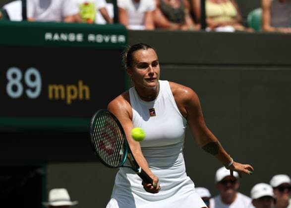 30th June 2025; All England Lawn Tennis and Croquet Club, London, England; Wimbledon Tennis Tournament, Day 1; Aryna Sabalenka (BLR) with a forehand shot to Carson Branstine (CAN)  ActionPlus12807213 JohnxPatrickxFletcher