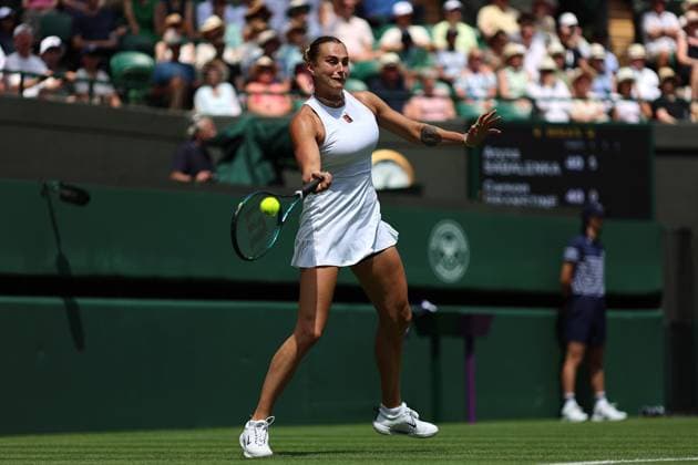 30th June 2025; All England Lawn Tennis and Croquet Club, London, England; Wimbledon Tennis Tournament, Day 1; Aryna Sabalenka (BLR) with a forehand shot to Carson Branstine (CAN)  ActionPlus12807230 JohnxPatrickxFletcher