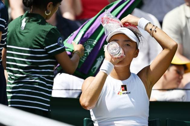 (250630) -- LONDON, June 30, 2025 -- Yuan Yue reacts during the women s singles first round match between Eva Lys of Germany and Yuan Yue of China at Wimbledon Tennis Championship in London, Britain, June 30, 2025. ) (SP)BRITAIN-LONDON-TENNIS-WIMBLEDON-WOMEN S SINGLES ZhaoxDingzhe 