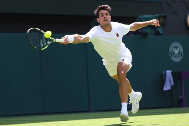 June 30, 2025, London, Celestynow, England: CARLOS ALCARAZ of Spain during the match against F. Fognini of Italy in the first round of Championships 2025 at Wimbledon AELTC in London. London England - ZUMAc278 20250630_zsp_c278_013 Copyright: xMarcinxCholewinskix