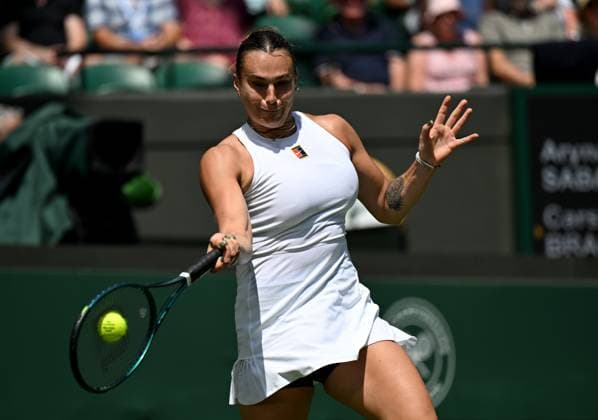 (250630) -- LONDON, June 30, 2025 -- Aryna Sabalenka hits a return during the women s singles first round match between Aryna Sabalenka of Belarus and Carson Branstine of Canada at Wimbledon tennis Championship in London, Britain, June 30, 2025. ) (SP)BRITAIN-LONDON-TENNIS-WIMBLEDON-WOMEN S SINGLES LixYing 