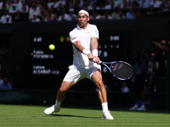 Wimbledon Championships 2025 AELTC, Day One, London, UK - 30 06 2025 Fabio Fognini (ITA) in action during his first round match against Carlos Alcaraz (ESP) in the 2025 Wimbledon Championships London Wimbledon London GBR, UK NEWSPAPERS OUT Copyright: xMarkxGreenwoodx