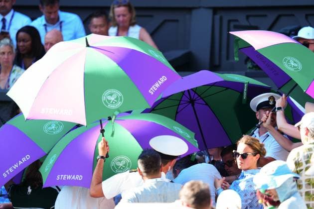 Ambulance crew attend to a medical emergency in the crowd on Centre Court Wimbledon Tennis Championships, Day 1, The All England Lawn Tennis and Croquet Club, London, UK - 30 Jun 2025London The All England Lawn Tennis and United Kingdom  Copyright: xJavierxGarcia Shutterstockx 15378843iv