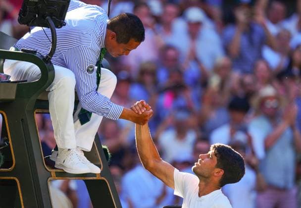 Carlos Alcaraz congratulated by umpire James Keothavong after victory in his first round match Wimbledon Tennis Championships, Day 1, The All England Lawn Tennis and Croquet Club, London, UK - 30 Jun 2025London The All England Lawn Tennis and United Kingdom  Copyright: xJavierxGarcia Shutterstockx 15378843ke