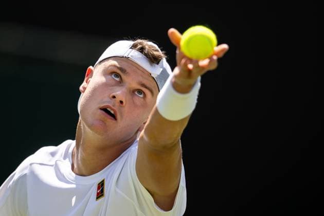 250630 Holger Rune of Denmark competes in a first round singles tennis match during day 1 of Wimbledon on June 30, 2025 in London Photo Petter Arvidson BILDBYRAN kod PA PA1043 tennis wimbledon day 1 bbeng danmark  Copyright: PETTERxARVIDSON BB250630PA033