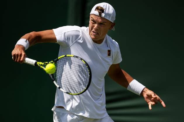 250630 Holger Rune of Denmark competes in a first round singles tennis match during day 1 of Wimbledon on June 30, 2025 in London Photo Petter Arvidson BILDBYRAN kod PA PA1043 tennis wimbledon day 1 bbeng danmark  Copyright: PETTERxARVIDSON BB250630PA034