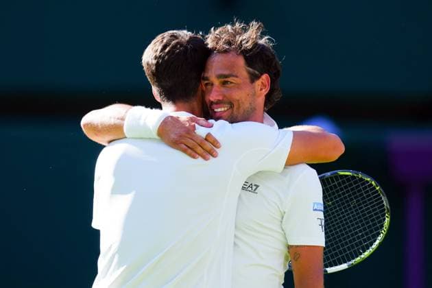 Carlos Alcaraz is congratulated by Fabio Fognini after their first round match Wimbledon Tennis Championships, Day 1, The All England Lawn Tennis and Croquet Club, London, UK - 30 Jun 2025London The All England Lawn Tennis and United Kingdom  Copyright: xJavierxGarcia Shutterstockx 15378843kg