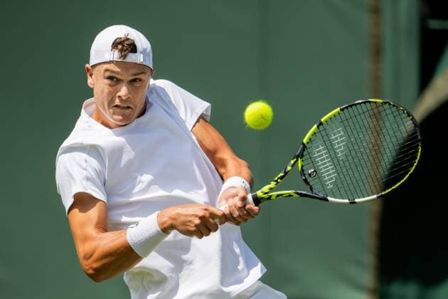 250630 Holger Rune of Denmark competes in a first round singles tennis match during day 1 of Wimbledon on June 30, 2025 in London Photo Petter Arvidson BILDBYRAN kod PA PA1043 tennis wimbledon day 1 bbeng danmark  Copyright: PETTERxARVIDSON BB250630PA039