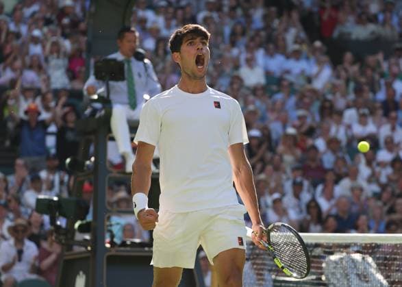 30th June 2025; All England Lawn Tennis and Croquet Club, London, England; Wimbledon Tennis Tournament, Day 1; Carlos Alcaraz (ESP) celebrates towards his coaches after winning a vital game against Fabio Fognini (ITA)  ActionPlus12807298 JohnxPatrickxFletcher