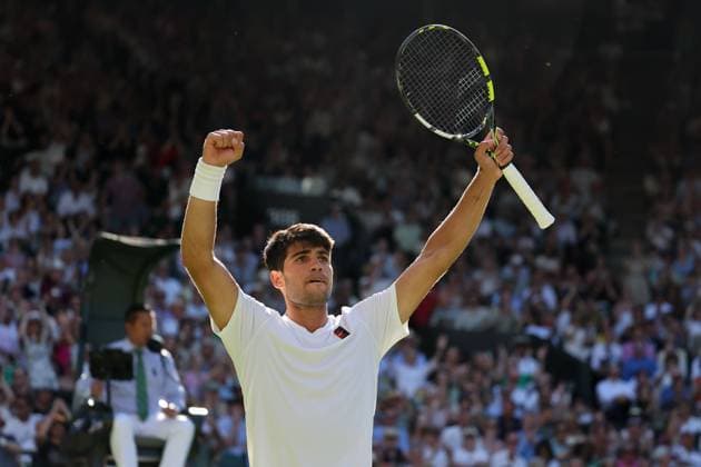 30th June 2025; All England Lawn Tennis and Croquet Club, London, England; Wimbledon Tennis Tournament, Day 1; Carlos Alcaraz (ESP) celebrates towards his coaches after winning a vital game against Fabio Fognini (ITA)  ActionPlus12807299 JohnxPatrickxFletcher