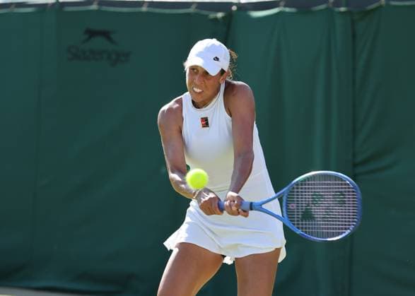30th June 2025; All England Lawn Tennis and Croquet Club, London, England; Wimbledon Tennis Tournament, Day 1; Madison Keys (USA) with a backhand shot to Elena-Gabriela Ruse (ROM)  ActionPlus12807314 JohnxPatrickxFletcher