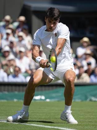 Day One: The Championships - Wimbledon 2025 LONDON, ENGLAND - JUNE 30: Carlos Alcaraz of Spain in action against Fabio Fognini of Italy (not pictured) during their Gentlemen s Singles Ladies Singles first round match on day one of The Championships Wimbledon 2025 at All England Lawn Tennis and Croquet Club on June 30, 2025 in London, England. Carlos Alcaraz London All England Lawn Tennis and Croq England United Kingdom Copyright: xVisionhausx 776301249