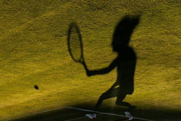 250630 The shadow of Marie Bouzkova of Czech Republic during a first round singles tennis match during day 1 of Wimbledon on June 30, 2025 in London Photo Petter Arvidson BILDBYRAN code PA PA1043 tennis wimbledon day 1 bbeng czech republic genre shadow tennis player anonymous anonymous  Copyright: PETTERxARVIDSON BB250630PA075