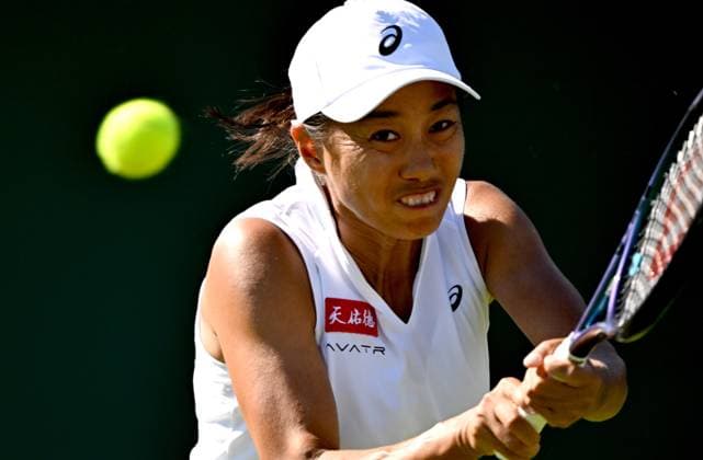 (250701) -- LONDON, July 1, 2025 -- Zhang Shuai hits a return during the women s singles first round match between Zhang Shuai of China and Olga Danilovic of Serbia at Wimbledon tennis Championship in London, Britain, June 30, 2025. ) (SP)BRITAIN-LONDON-TENNIS-WIMBLEDON-WOMEN S SINGLES LixYing 