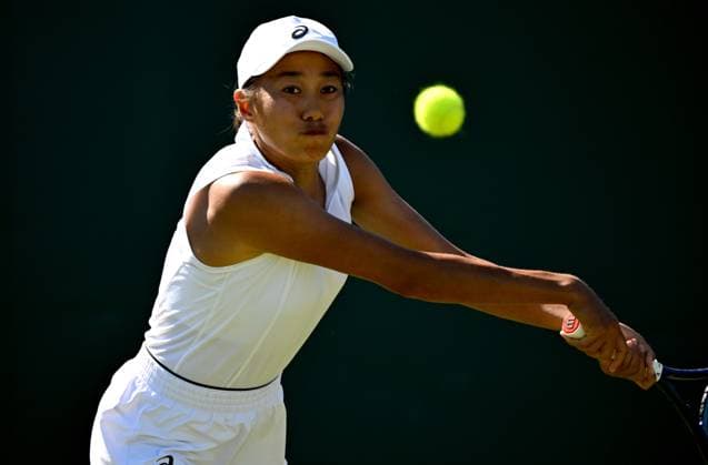 (250701) -- LONDON, July 1, 2025 -- Zhang Shuai hits a return during the women s singles first round match between Zhang Shuai of China and Olga Danilovic of Serbia at Wimbledon tennis Championship in London, Britain, June 30, 2025. ) (SP)BRITAIN-LONDON-TENNIS-WIMBLEDON-WOMEN S SINGLES LixYing 