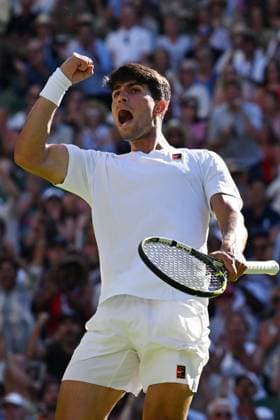 (250701) -- LONDON, July 1, 2025 -- Carlos Alcaraz reacts during the men s singles first round match between Carlos Alcaraz of Spain and Fabio Fognini of Italy at Wimbledon Tennis Championship in London, Britain, June 30, 2025. ) ) (SP)BRITAIN-LONDON-TENNIS-WIMBLEDON-MEN S SINGLES ZhaoxDingzhe 