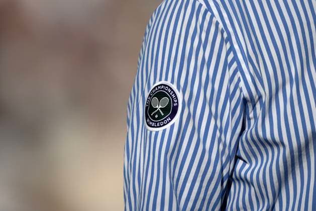 Day One: The Championships - Wimbledon 2025 LONDON, ENGLAND - JUNE 30: A detailed view of The Championships Wimbledon badge patch on the sleeve of an umpire during the Gentlemen s Singles first round match between Fabio Fognini of Italy and Carlos Alcaraz of Spain on day one of The Championships Wimbledon 2025 at All England Lawn Tennis and Croquet Club on June 30, 2025 in London, England. London All England Lawn Tennis and Croq England United Kingdom Copyright: xVisionhausx 776301249