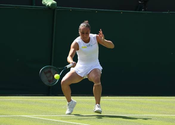 1st July 2025; All England Lawn Tennis and Croquet Club, London, England; Wimbledon Tennis Tournament, Day 2; Elisabetta Cocciaretto (ITA) with a forehand shot to Jessica Pegula (USA)  ActionPlus12807356 JohnxPatrickxFletcher