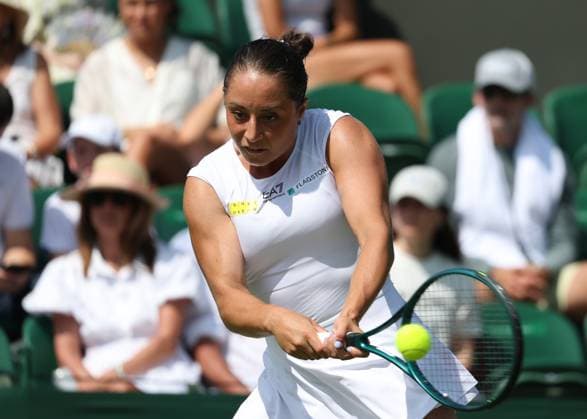 1st July 2025; All England Lawn Tennis and Croquet Club, London, England; Wimbledon Tennis Tournament, Day 2; Elisabetta Cocciaretto (ITA) with a backhand shot to Jessica Pegula (USA)  ActionPlus12807360 JohnxPatrickxFletcher