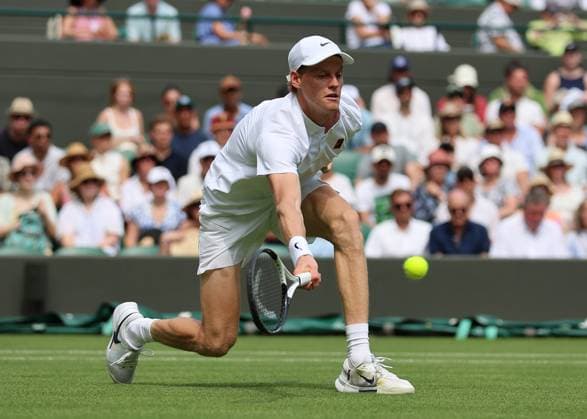 1st July 2025; All England Lawn Tennis and Croquet Club, London, England; Wimbledon Tennis Tournament, Day 2; Jannik Sinner (ITA) with a forehand shot to Luca Nardi (ITA)  ActionPlus12807550 JohnxPatrickxFletcher