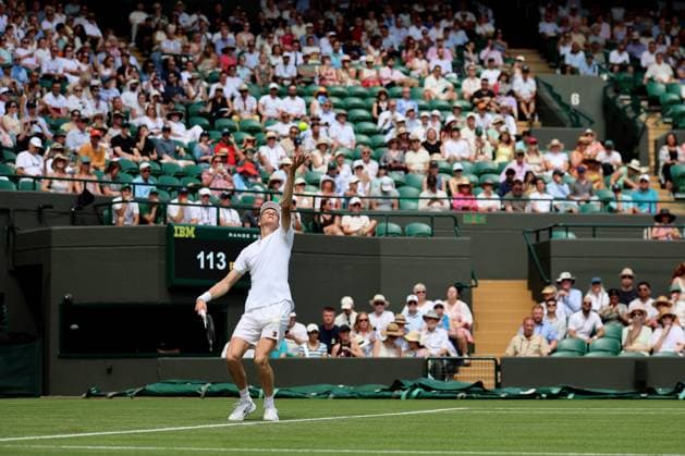 1st July 2025; All England Lawn Tennis and Croquet Club, London, England; Wimbledon Tennis Tournament, Day 2; Jannik Sinner (ITA) serves to Luca Nardi (ITA)  ActionPlus12807551 JohnxPatrickxFletcher