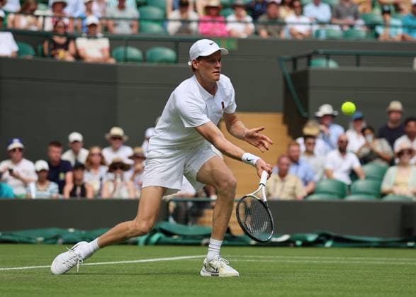 1st July 2025; All England Lawn Tennis and Croquet Club, London, England; Wimbledon Tennis Tournament, Day 2; Jannik Sinner (ITA) with a forehand shot to Luca Nardi (ITA)  ActionPlus12807552 JohnxPatrickxFletcher
