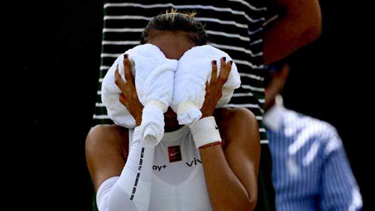 (250701) -- LONDON, July 1, 2025 -- Zheng Qinwen reacts during the women s singles first round match between Zheng Qinwen of China and Katerina Siniakova of the Czech Republic at the Wimbledon Tennis Championships in London, Britain, July 1, 2025. ) (SP)BRITAIN-LONDON-TENNIS-WIMBLEDON-WOMEN S SINGLES LixYing 