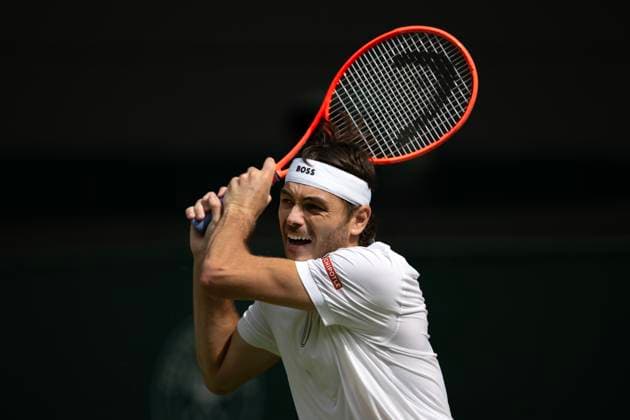 Day Two: The Championships - Wimbledon 2025 LONDON, ENGLAND - JULY 1: Taylor Fritz of United States in action against Giovanni Mpetshi Perricard of France (not pictured) during the Gentlemen s first round match on day two of The Championships Wimbledon 2025 at All England Lawn Tennis and Croquet Club on July 1, 2025 in London, England. Taylor Fritz London All England Lawn Tennis and Croq England United Kingdom Copyright: xVisionhausx 776301250