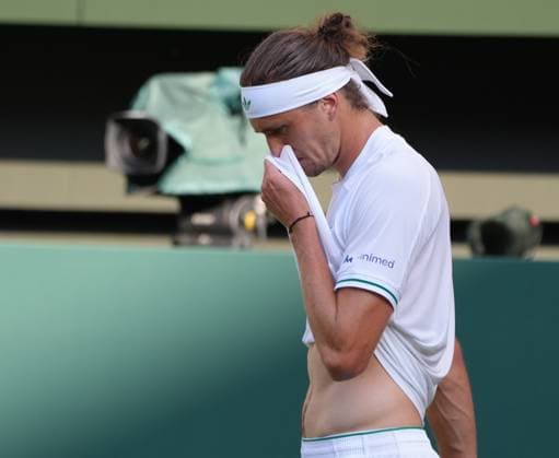 Tennis - 2025 Wimbledon Championships - Men™s Singles - Round One - Alexander Zverev v Arthur Rinderknech All England Lawn Tennis & Croquet Club - Tuesday 1st July 2025 A dejected Alexander Zverev at match point down 