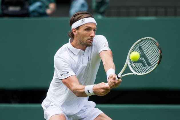 250701 Arthur Rinderknech of France competes in a first round singles tennis match during day 2 of Wimbledon on July 1, 2025 in London Photo Petter Arvidson BILDBYRAN kod PA PA1045 tennis wimbledon day 2 bbeng  Copyright: PETTERxARVIDSON BB250701PA047