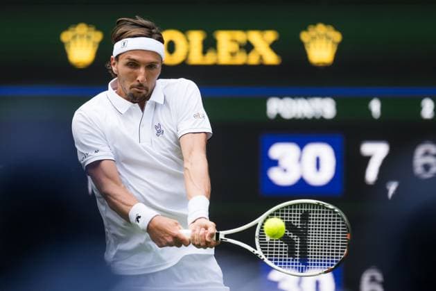 250701 Arthur Rinderknech of France competes in a first round singles tennis match during day 2 of Wimbledon on July 1, 2025 in London Photo Petter Arvidson BILDBYRAN kod PA PA1045 tennis wimbledon day 2 bbeng  Copyright: PETTERxARVIDSON BB250701PA048