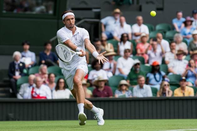 250701 Arthur Rinderknech of France competes in a first round singles tennis match during day 2 of Wimbledon on July 1, 2025 in London Photo Petter Arvidson BILDBYRAN kod PA PA1045 tennis wimbledon day 2 bbeng  Copyright: PETTERxARVIDSON BB250701PA049