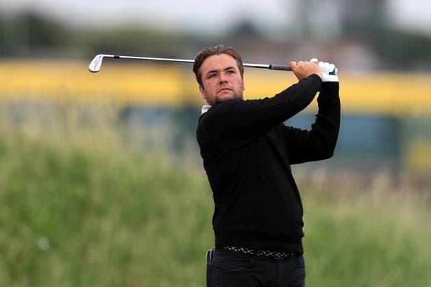 1st July 2025, West Lancashire Golf Club, Blundellsands, Liverpool, England; Final Qualifying for The Open Championship ; Jack Bigham (ENG) (a) plays his tee shot on the par three 6th hole  ActionPlus12807657 DavidxBlunsden