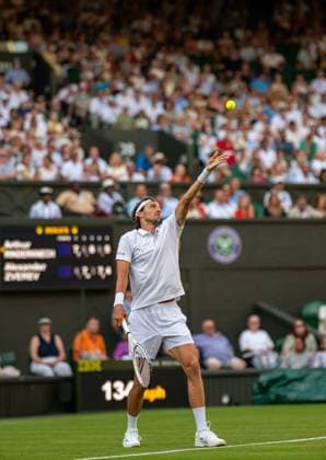 Tennis - Wimbledon Championship 2025 - Day 2 LONDON, ENGLAND - Tuesday, July 1, 2025: Arthur Rinderknech (FRA) serves during the Gentlemen s Singles 1st Round on Day Two of The Championships Wimbledon 2025 at the All England Lawn Tennis and Croquet Club. Rinderknech won 7-6(3) 6-7(10) 6-3 6-7(7) 6-4. (Photo by Kirsten Holst Propaganda) LONDON All England Lawn Tennis and Croquet Club GREATER LONDON ENGLAND  Copyright: xKirstenxHolstx 2025-07-01-127-Wimbledon_Day_2