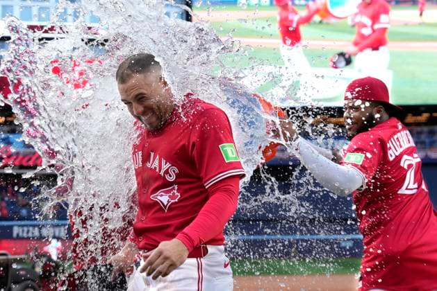 July 1, 2025, Toronto, On, CANADA: Toronto Blue Jays Vladimir Guerrero Jr. douses teammate George Springer with water after their victory over the New York Yankees in MLB, Baseball Herren, USA baseball action in Toronto on Tuesday, July 1, 2025. Canada News - July 1, 2025  - ZUMAc35_ 20250701_zaf_c35_163 Copyright: xFrankxGunnx