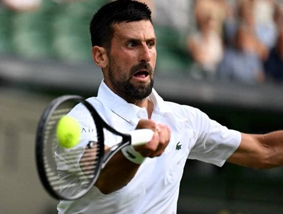 (250702) -- LONDON, July 2, 2025 -- Novak Djokovic hits a return during the men s singles first round match between Novak Djokovic of Serbia and Alexandre Muller of France at the Wimbledon Tennis Championships in London, Britain, July 1, 2025. ) (SP)BRITAIN-LONDON-TENNIS-WIMBLEDON-MEN S SINGLES LixYing 