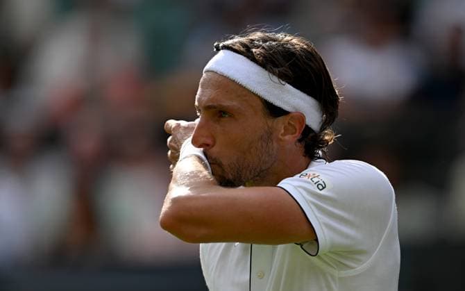 (250702) -- LONDON, July 2, 2025 -- Arthur Rinderknech reacts during the men s singles first round match between Alexander Zverev of Germany and Arthur Rinderknech of France at the Wimbledon Tennis Championships in London, Britain, July 1, 2025. ) (SP)BRITAIN-LONDON-TENNIS-WIMBLEDON-MEN S SINGLES LixYing 