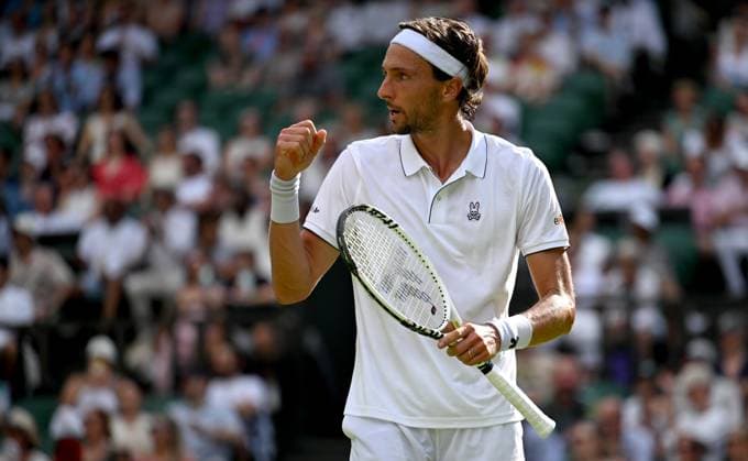 (250702) -- LONDON, July 2, 2025 -- Arthur Rinderknech celebrates scoring during the men s singles first round match between Alexander Zverev of Germany and Arthur Rinderknech of France at the Wimbledon Tennis Championships in London, Britain, July 1, 2025. ) (SP)BRITAIN-LONDON-TENNIS-WIMBLEDON-MEN S SINGLES LixYing 